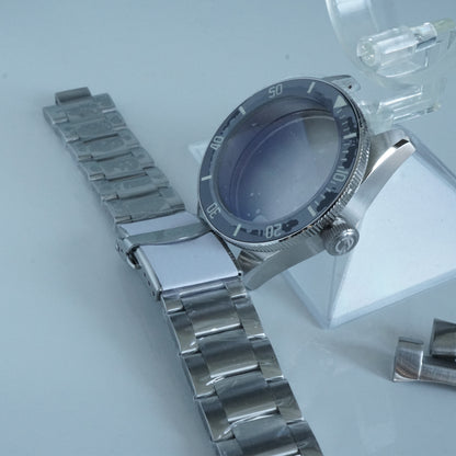 photo of watch case and bracelet